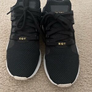adidas EQT Black Sneakers with White Midsoles and Gold Accents